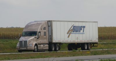 alt="You are currently viewing Knight and Swift Transportation Join Together To Form Trucking Giant"